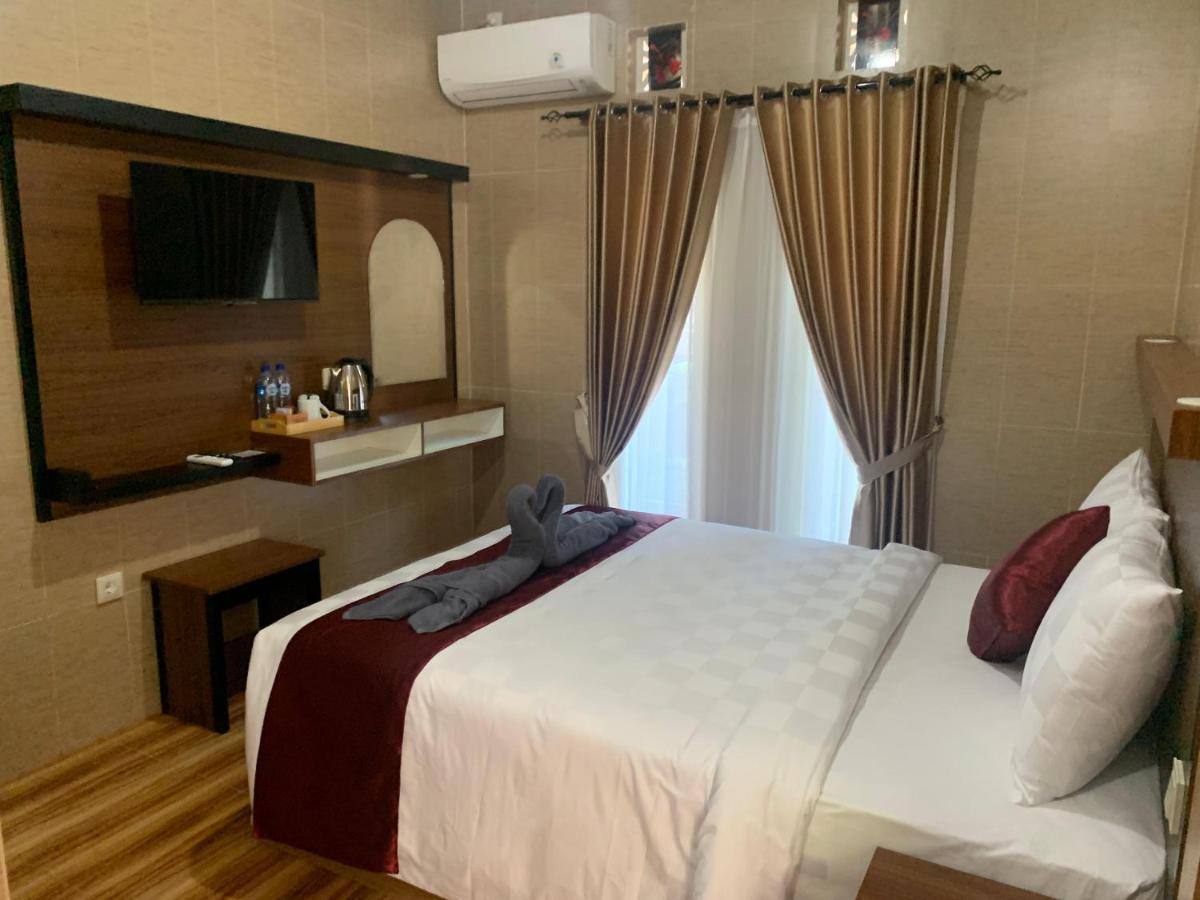 Tirtasuci House Hotel กูตา ภายนอก รูปภาพ